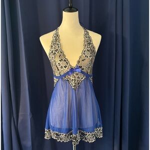 Blue, black, and white lace and mesh halter top lingerie top